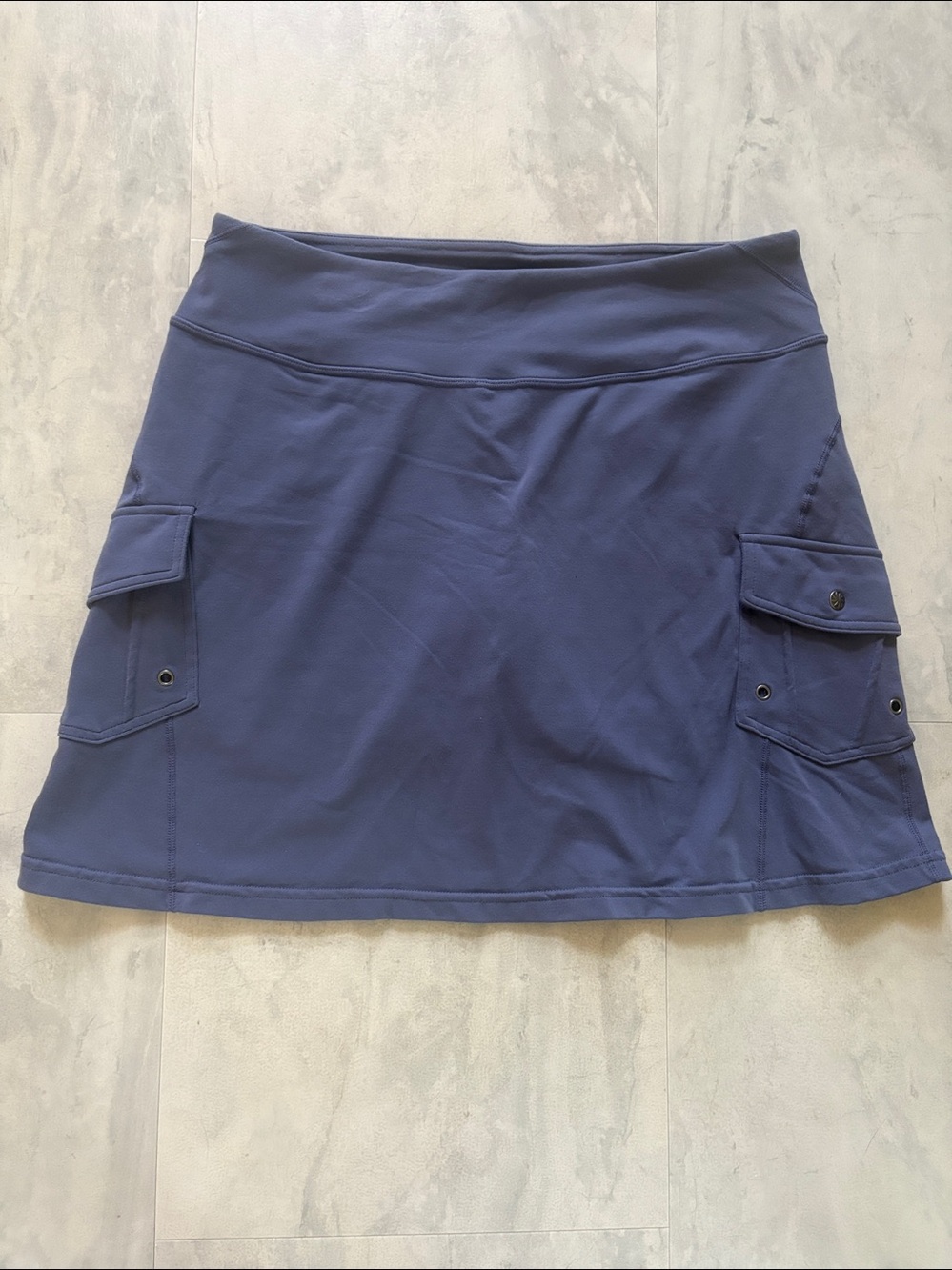 Athleta Skort. Periwinkle/2 cargo pockets. Built-in shorts size M